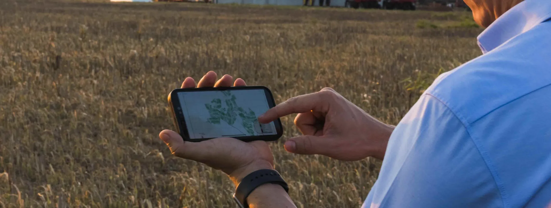 Farmer using technology in the field