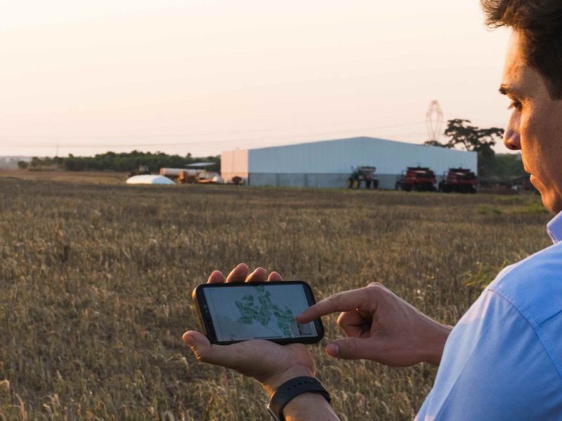 Farmer using technology in the field