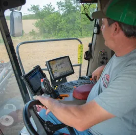 Farmer using technology in his planter