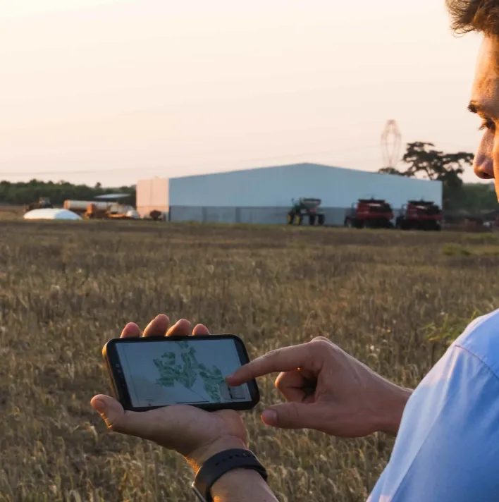 Farmer using technology in the field