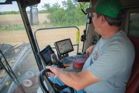 Farmer using technology in his planter